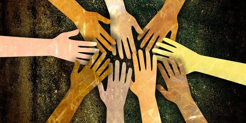 Hands joined in community support